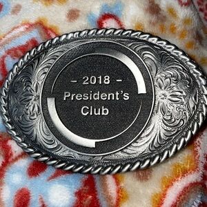 CAROL FLANAGAN 2018 President’s Club Silver tone Buckle